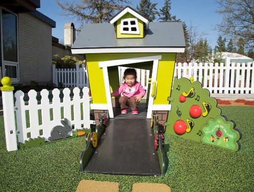 Child playing in tot lot