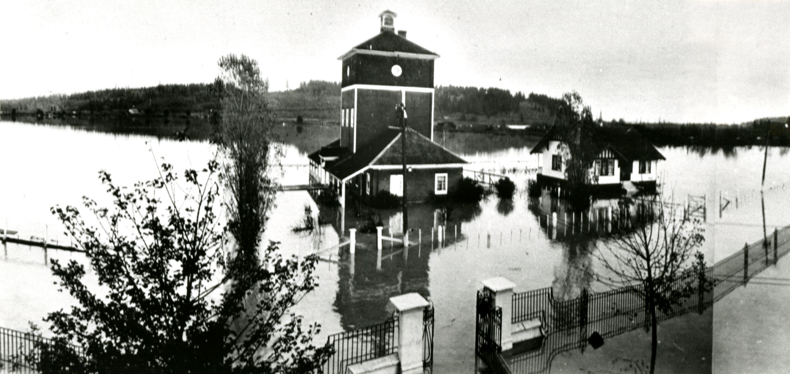 Farm buildings under water at Colony Farm, 1948 (Source City of Coquitlam Archives, C6.639) Opens in new window